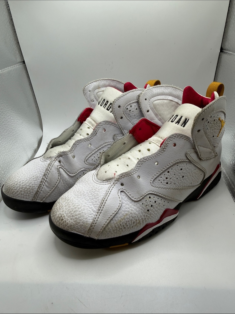 Jordan White Basketball Sneakers with Red & Yellow Accents